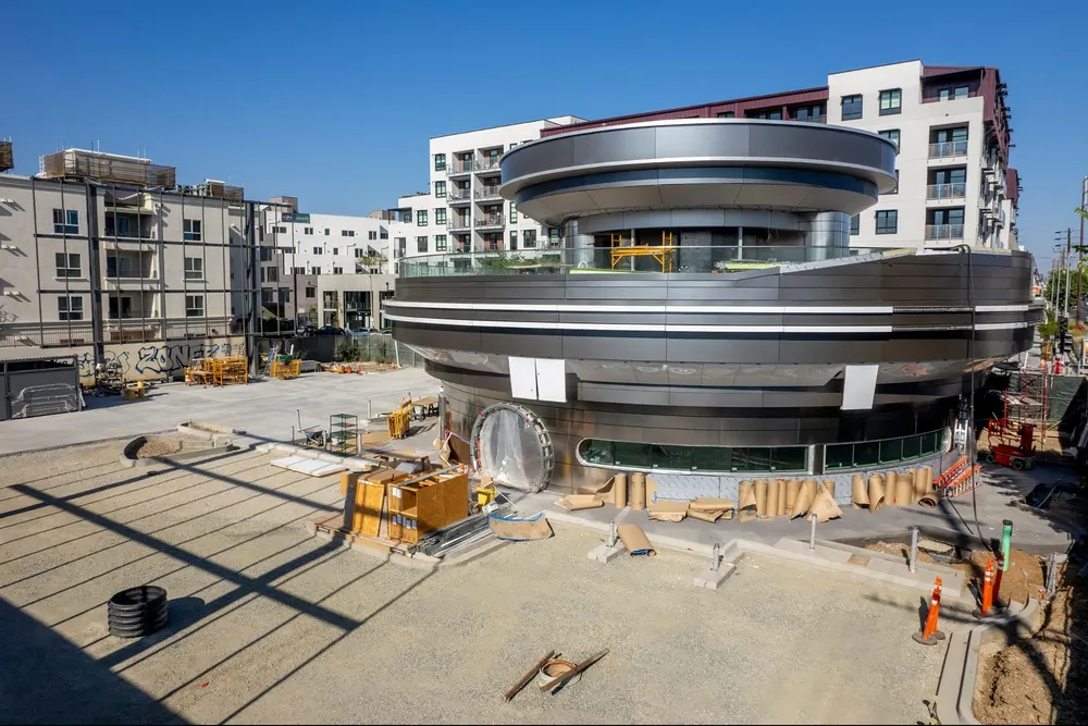 1742575274-teslas-50s-diner-themed-charging-station-under-construction-0325-g-2180131646